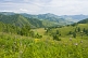 Mountains, flower-filled meadows, and farmland of the Altai Republic.