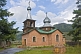 Image of Brick-built Russian Orthodox church with onion domes.