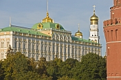 Green copper roofs and golden domes of the Great Kremlin Palace.