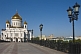 Image of The gold-domed Cathedral of Christ the Saviour stands next to the Moscow River.