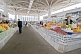 Image of Shoppers and stall holders in the central covered fruit market.