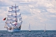 The square rigger 'Sagres' sails past two spectator yachts off the Massachusetts coast.
