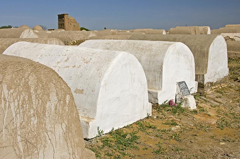 Mud-built Muslim raised graves combat the high water-table of the Oxus valley.
