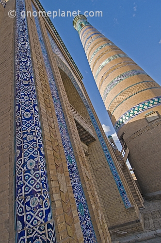 Closeup of the traditional glazed blue ceramic tiles adorning the frontage of the Minaret and Madrassah of Islam-Khodja.