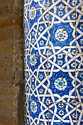 Detail of ornate blue glazed ceramic tilework on the Amin Khan Madrassah.