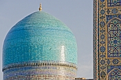 Blue-tiled domes of the Tilla-Kari Medressa.