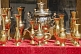 Image of A samovar and brass jugs for sale in the bazaar.