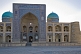 Image of Blue domes and tiled frontage of the Mir-I-Arab Medressa.