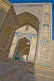 Image of Blue ceramic tilework reflects the sunlight on the arch of the Kalyan Mosque.