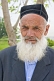 Image of Local elderly Uzbek man with white beard and traditional hat.