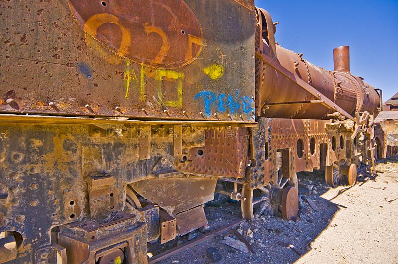 Rusting steam locomotives in the cemetery of steam engines.
