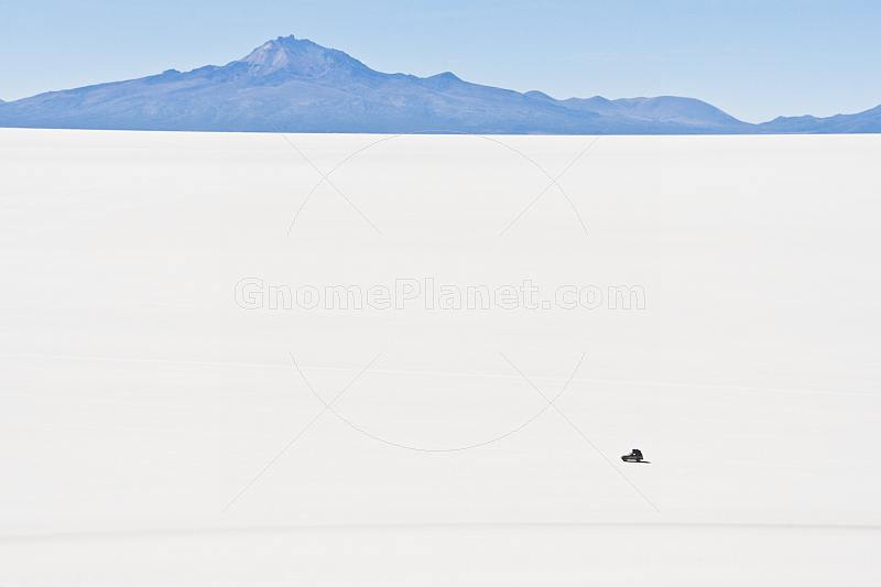 4WD vehicle crossing the Uyuni Salt Flats.