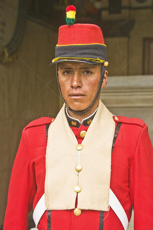 Guardsman in red uniform outside the Presidential Palace (Palacio Presidencial).