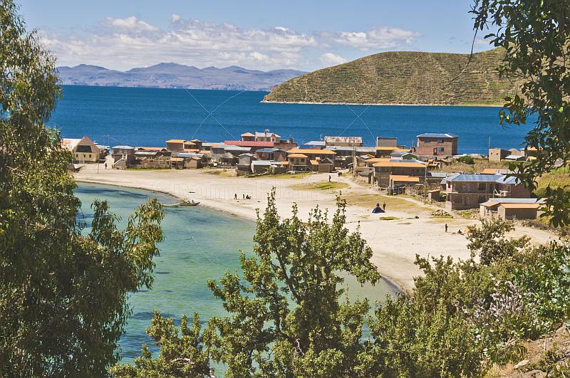 Beach houses and harbor on the Isla del Sol in Lake Titicaca.