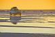 Image of Toyota 4WD crossing the Uyuni Salt Flats at sunset.