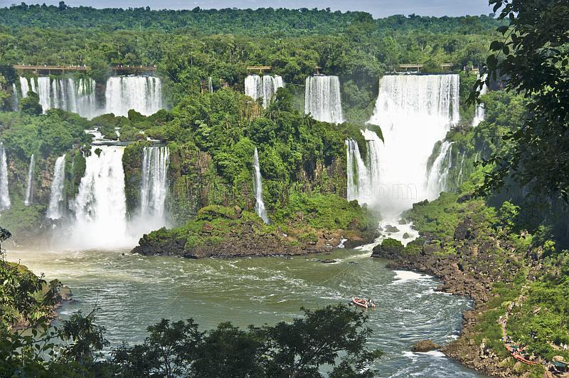 Multiple waterfalls and jungle at the Iguazu Falls.
