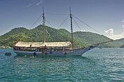 Swimming from a schooner in the waters of the Bahia Da Ilha Grande.