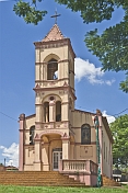 The pink stucco Igreja Santa Cruz on Rua Francisco Costa.