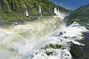Waterfalls cascade into the Iguazu River.