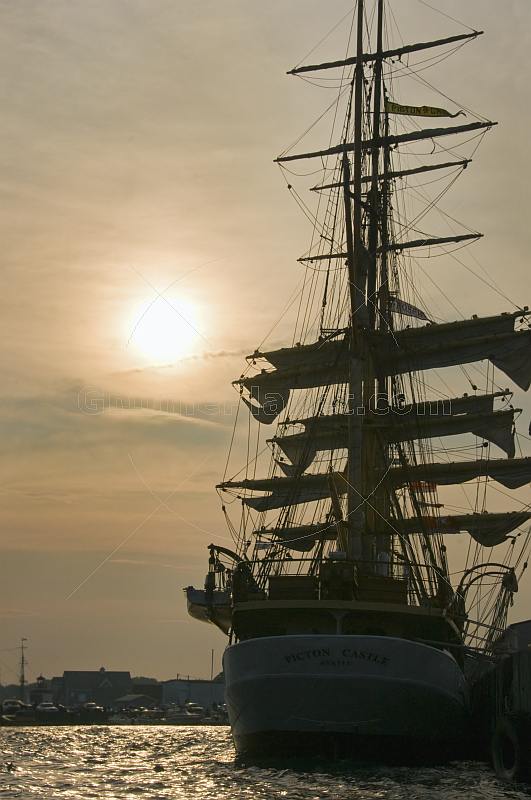 The barque 'Picton Castle' moored in Pictou Harbor at sunset.