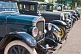 Image of A row of vintage motor cars parked on Queens Street.