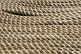 Image of Lines of white rope stacked close together.