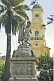 Image of Statue in the Plaza de Armas and the National History Museum in background.