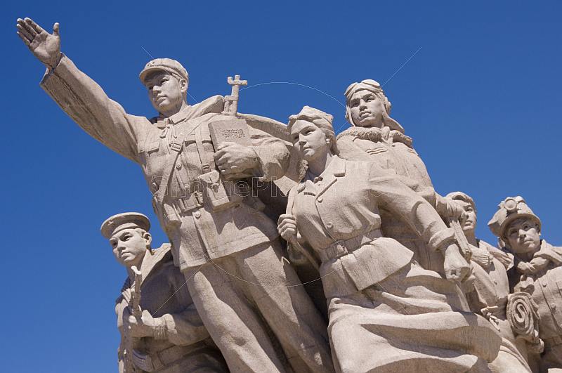 War Memorial showing members of the Chinese armed services in Tiananmen Square.