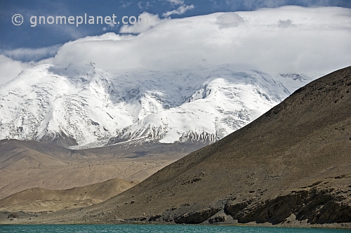 Snow-capped Pamir Mountains next to Karakul Lake, on the Karakoram Highway between Kashgar and Tashkurgan.