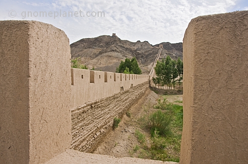 Looking along the battlements of the reconstructed Great Wall of China at the Shiguan Gorge, near Jiayuguan.