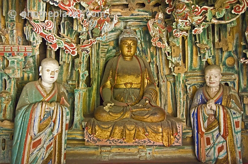 Buddhist and Bodhisattva statues in Hanging Monastery interior.