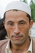 Muslim man in skullcap at the Sunday Animal Market.