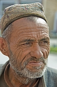 Elderly Uighur man with hat.