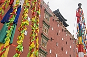 Putuozongcheng Buddhist Temple exterior with prayer flags.