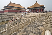 Chinese tourists climb the stairs to the Hall of Preserving Harmony in the Forbidden City.