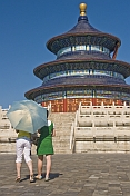 Two Chinese girls visit the Hall of Prayer for Good Harvests at the Temple of Heaven.