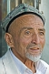 Image of Local man with Uighur hat and gold teeth.