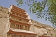 Chinese-style multi-layered roofs protect access to the Buddhist Mogao Caves.