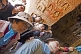 Image of Chinese tourists visit the Yungang Buddhist caves.