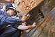 Image of Chinese tourists visit the Yungang Buddhist caves.