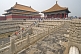 Image of Chinese tourists climb the stairs to the Hall of Preserving Harmony in the Forbidden City.