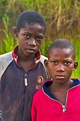 Portrait of two Congolese boys with background of tall grass.