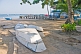 Image of Dinghys stacked on the beach at the Pointe Noire Yacht Club.
