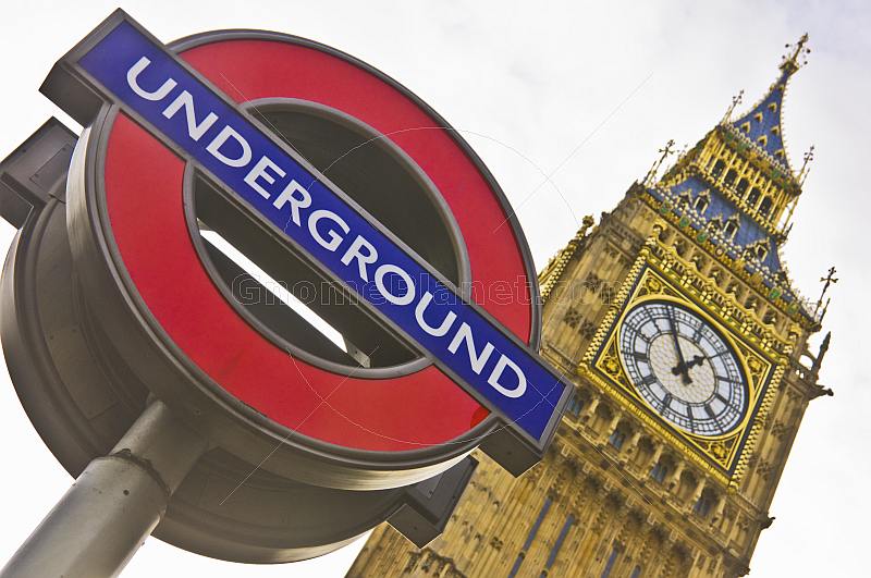 London Underground tube sign outside Big Ben clock tower and Houses of Parliament.
