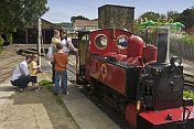 Family look at steam engine Fox at Kirklees Light Railway at Clayton West.