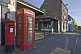 Red telephone kiosk and post box on the Market Place.