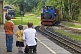 Image of Father and 2 sons photograph approaching steam train at Kirklees Light Railway at Clayton West.