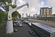 Image of The Silent Cargoes sculpture by artist James Wine at the side of Salford Quays on Manchester Ship Canal.