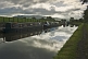 Image of Narrowboats moored on the Leeds Liverpool Canal at Broughton Road on cloudy day.