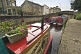 Narrow boats on the Leeds and Liverpool Canal at the Belmont Street Wharf.